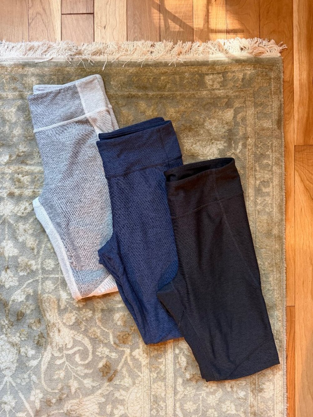 Three pairs of Outdoor Voices leggings
